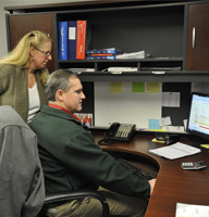 Employees Reviewing at Computer